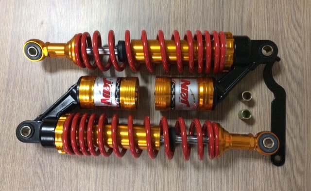 Основное фото Амортизатор задний комплект ALPHA, DELTA газомасляный с подкачкой 340мм золотисто-красный тюнинг